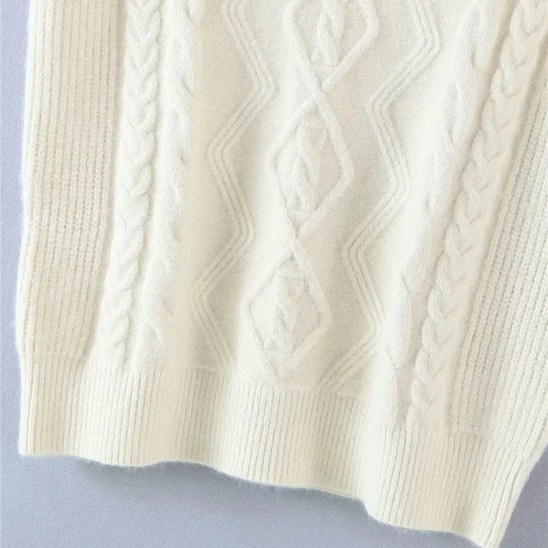 OVERSIZED CABLE KNIT VEST
