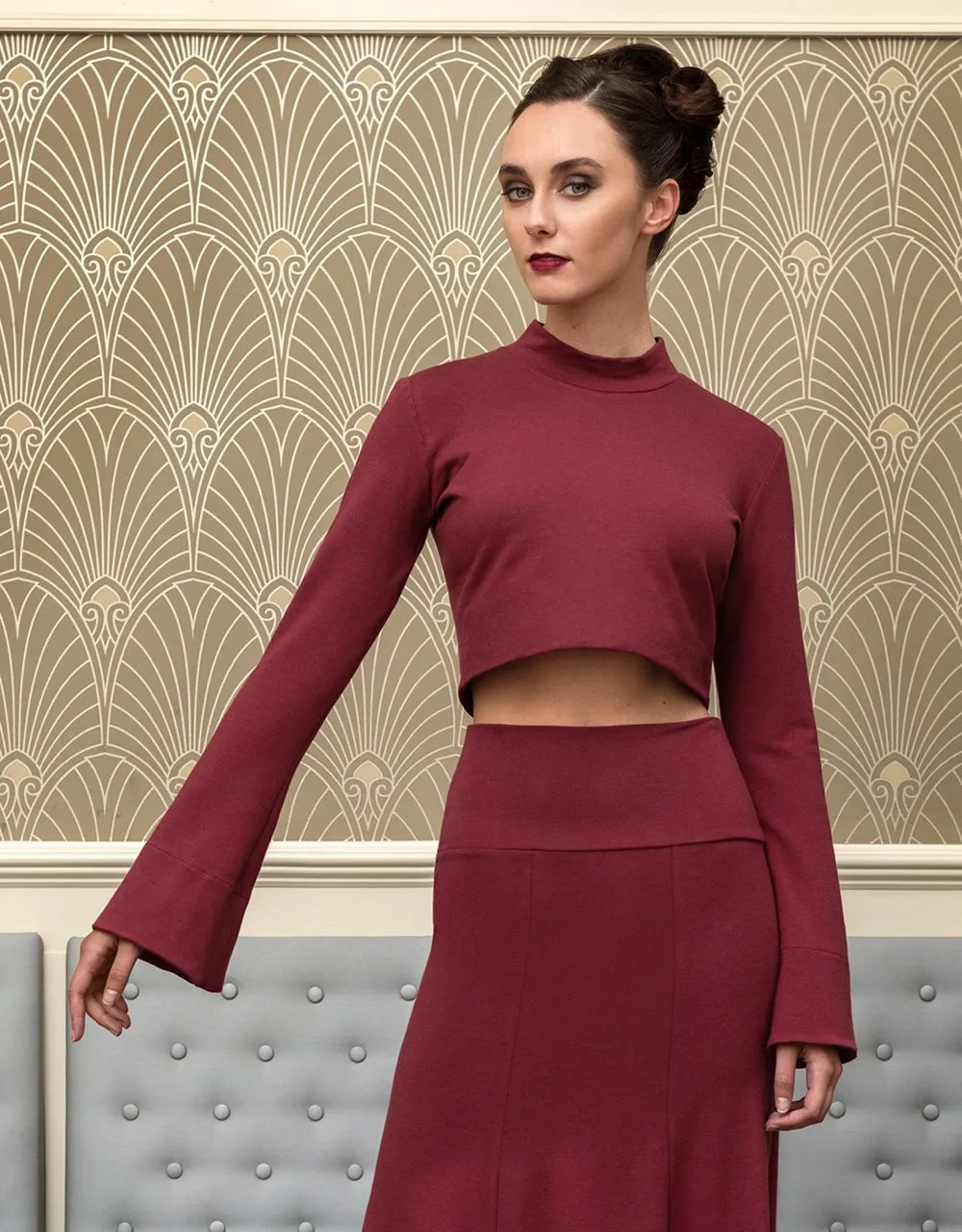 The Danika mock neck long bell sleeve crop top